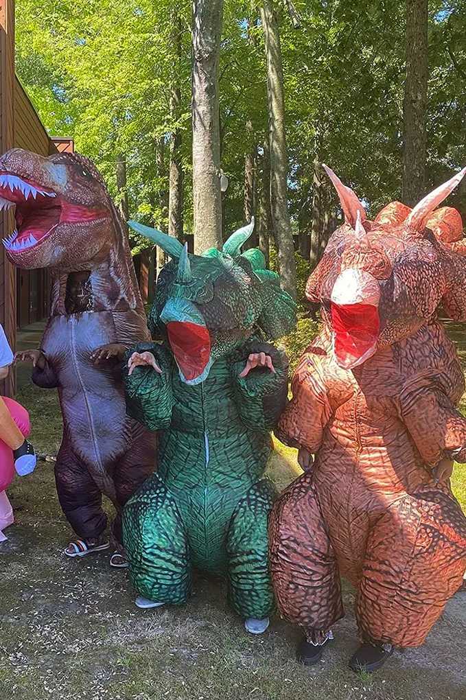 Inflatable Triceratops Costume with blow up T-Rex and brown Triceratops